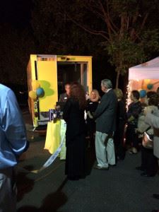 People gathered around a truck at a party